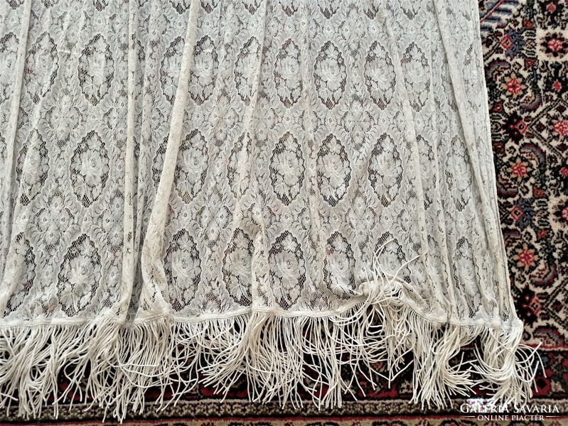 Long lace curtain with a skirt