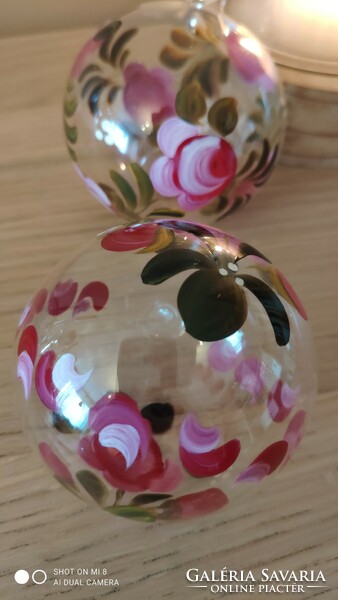 Pair of hand painted blown glass spheres with Christmas tree ornament