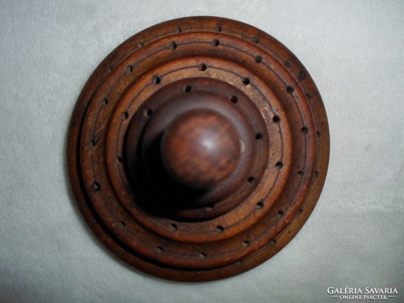 Art deco wooden holder with holes