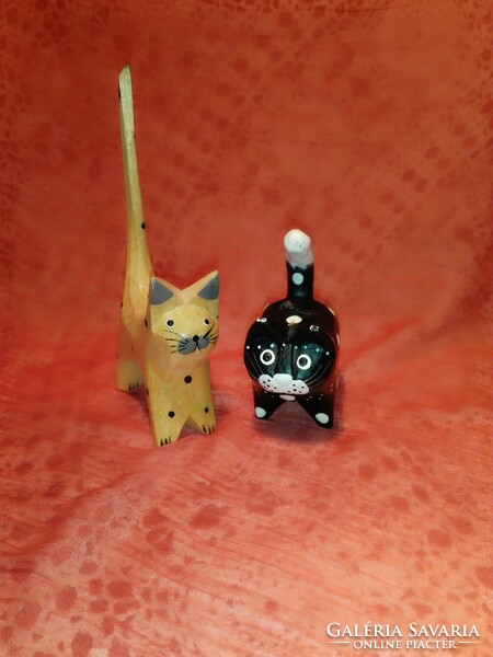 Wooden carved and painted cats.