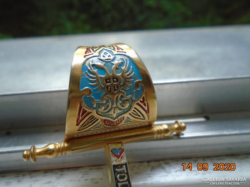 Two-headed imperial eagle with coat of arms of Toledo handmade with colorful enamel and gold ornamental sword
