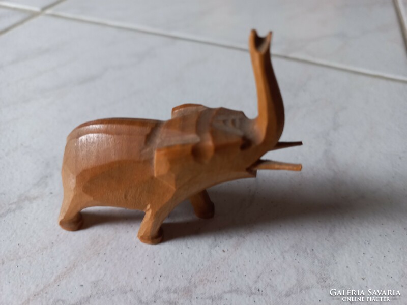 Hand-carved tiny wooden elephant