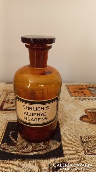 Antique apothecary glass, amber color, with original label, 15 cm high.