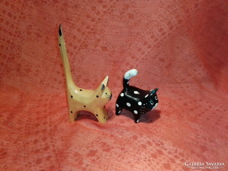 Wooden carved and painted cats.