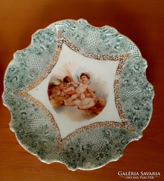 Two antique old Austrian glazed porcelain plates gilt angelic putto marked karlsbad britannia