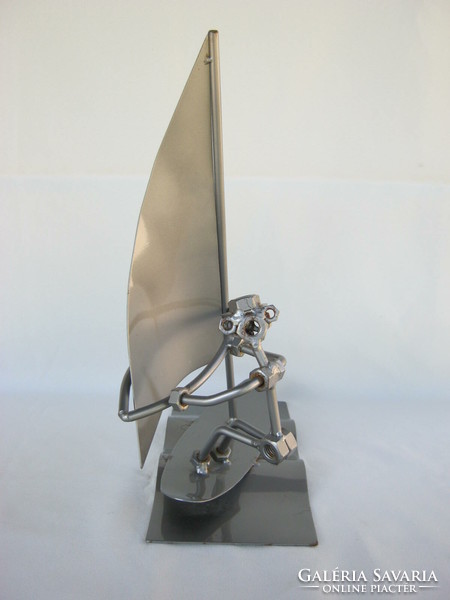 Loft design metal surfer figure