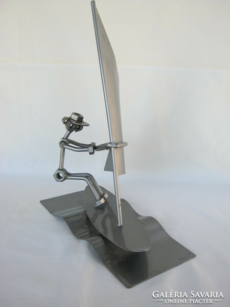 Loft design metal surfer figure