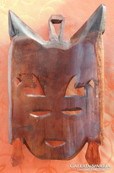 Oriental wood carved wall mask with elephant and native decor