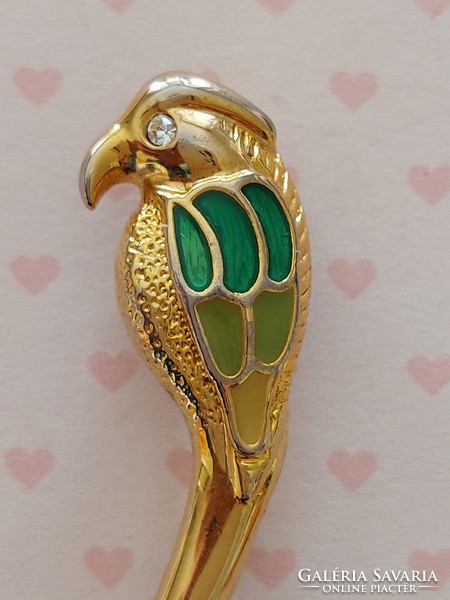 Retro female brooch with golden bird shaped green parrot metal badge