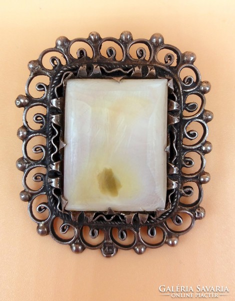 Silver filigree brooch with mother-of-pearl inlay