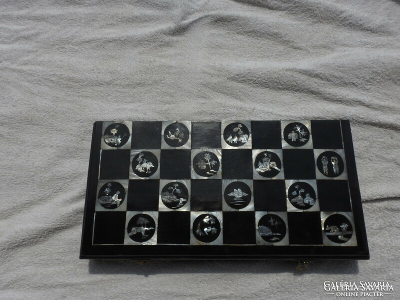 Antique oriental chess set with pearl board with bone-shaped wooden figures