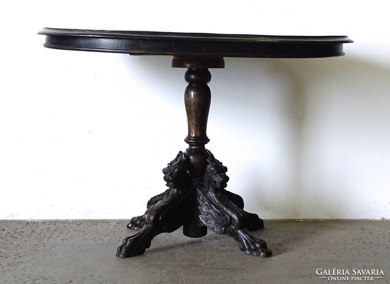 1L030 antique oval griffin coffee table