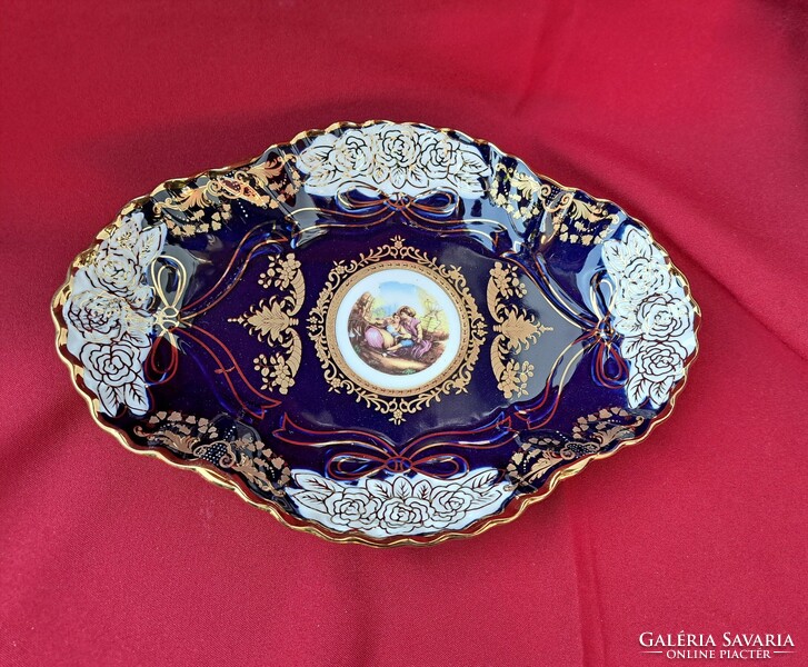 A beautiful blue scenic porcelain centerpiece offering a collector's item, a piece of nostalgia