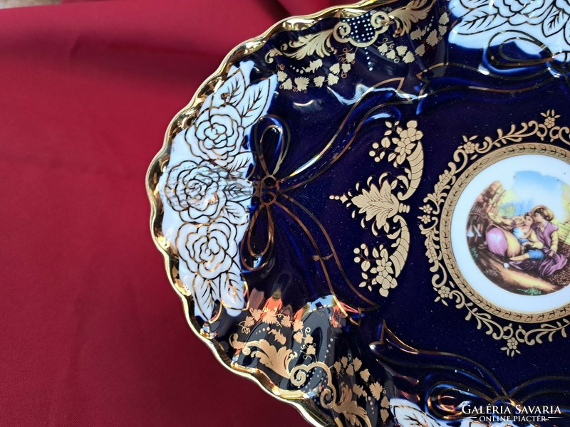 A beautiful blue scenic porcelain centerpiece offering a collector's item, a piece of nostalgia
