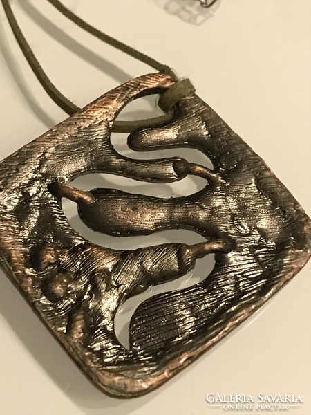 Fire enamel pendant on a leather strap, 4.5 x 4.5 cm