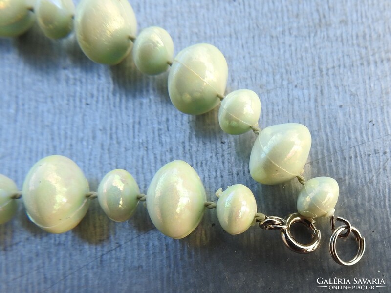 Greenish blue string of pearls necklace