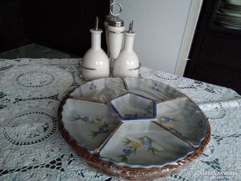 Porcelain seven-part divided serving tray with a woven coaster with a small pattern.
