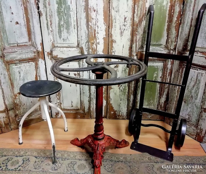 Patinated cast iron table, using old casting and well wheel, unique table, loft table