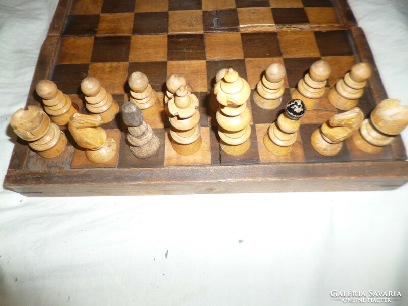 Old wooden chess set incomplete damaged