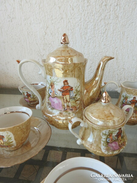 Hinge scene with polish tea set