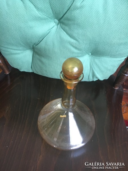 Amber colored vintage glass bottle