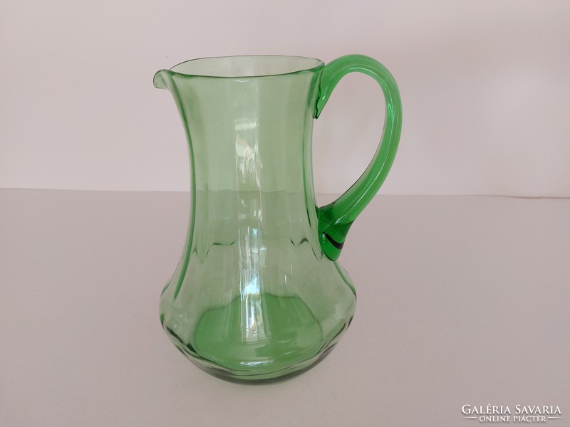 Retro wine jug green old glass jug