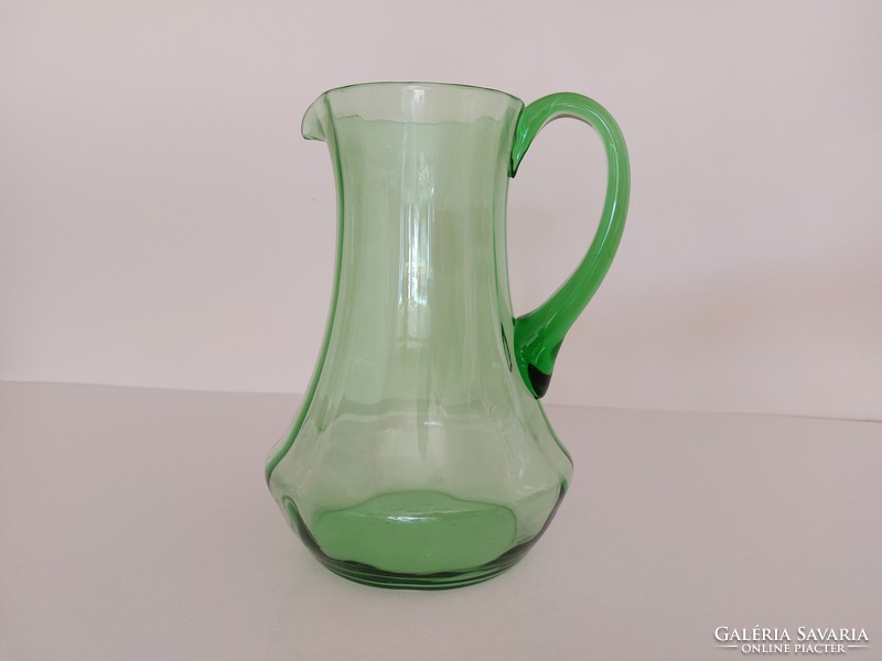 Retro wine jug green old glass jug