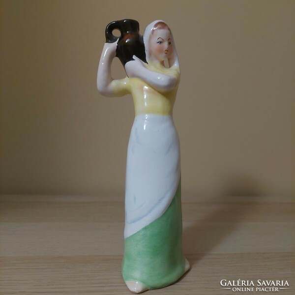 Bodrogkeresztúr ceramic figure of a woman with a jug