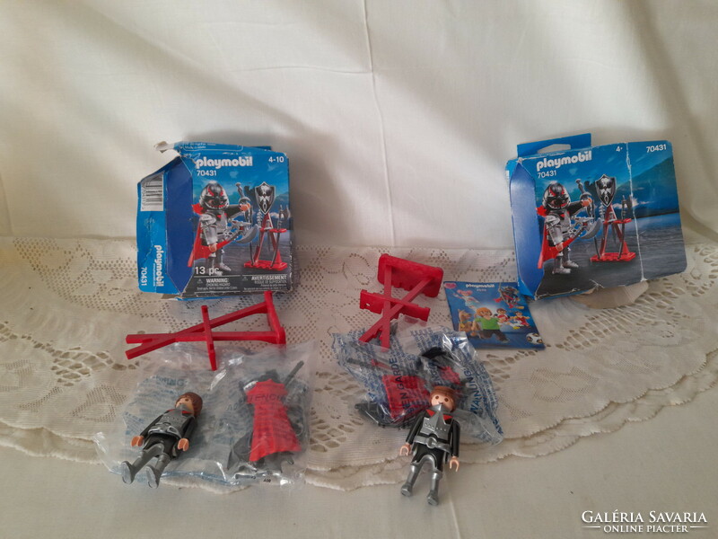 2 disassembled but unplayed playmobil figures in one