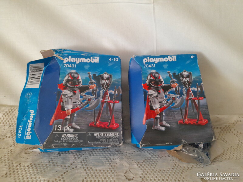2 disassembled but unplayed playmobil figures in one