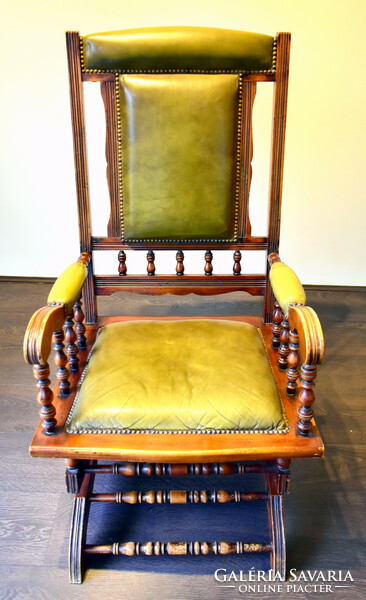 XIX. No. Antique spring rocking chair with leather surfaces !!!