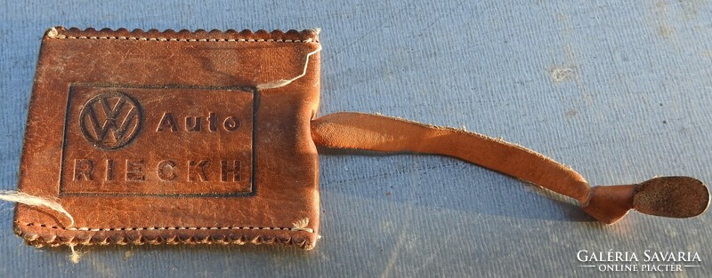 Old leather keychain - double-sided: volkswagen emblem and saint christopher