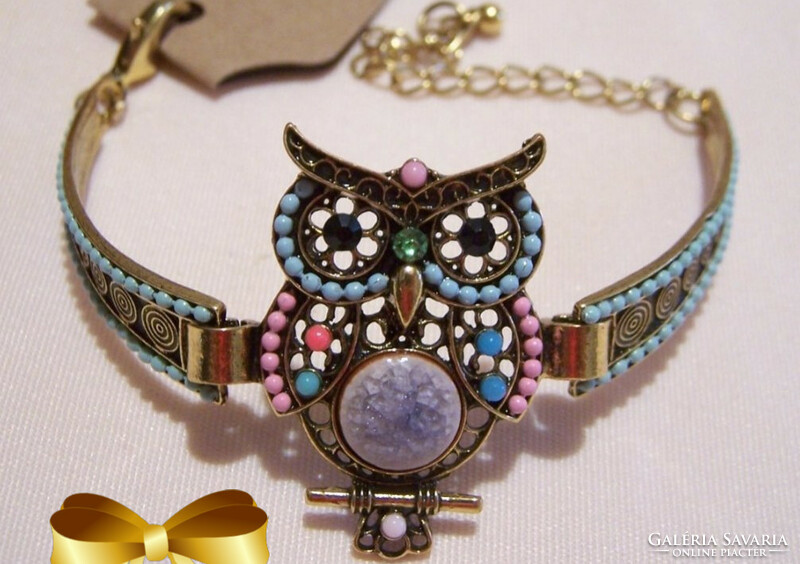 A new type, made with a special technique, bracelet with colored pearls and an owl.