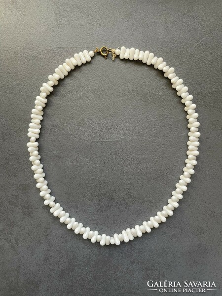 Old, rare white porcelain necklace