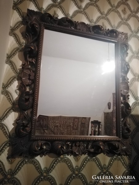 Carved framed mirror