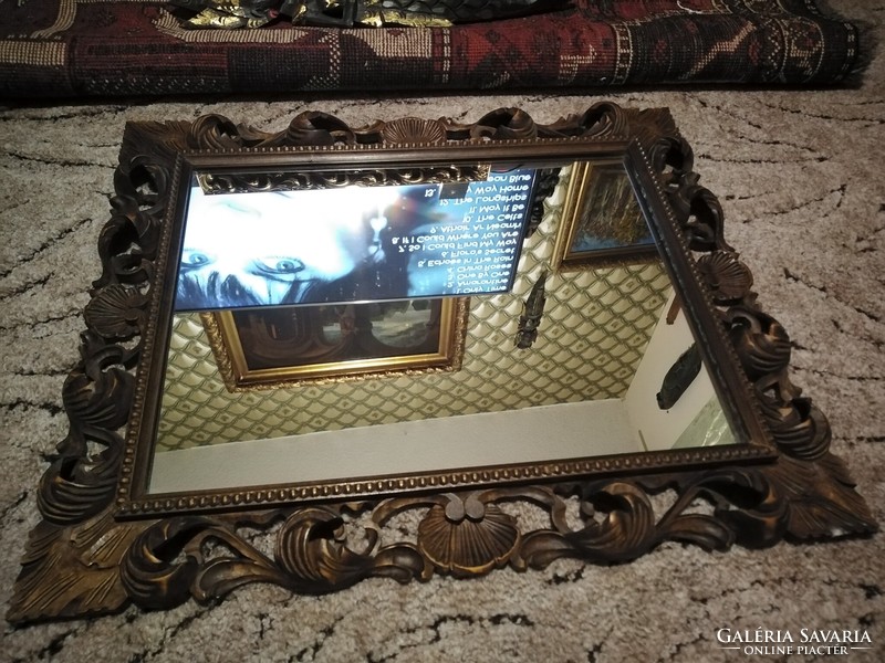 Carved framed mirror