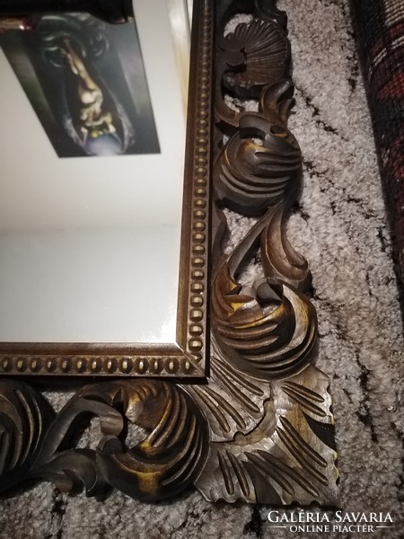 Carved framed mirror