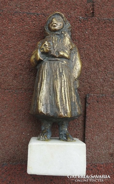 Bronze peasant girl statue on marble soles