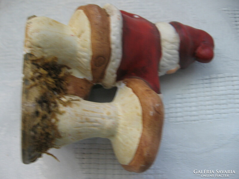 Retro Christmas elf, a dwarf figure with a mushroom
