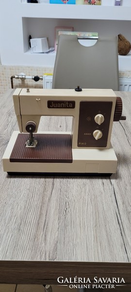 Piko juanita children's toy sewing machine.