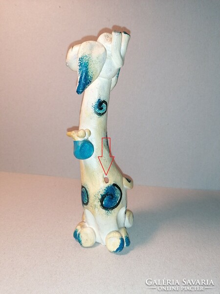 Incense holder with a cheeky ceramic giraffe with a small bird