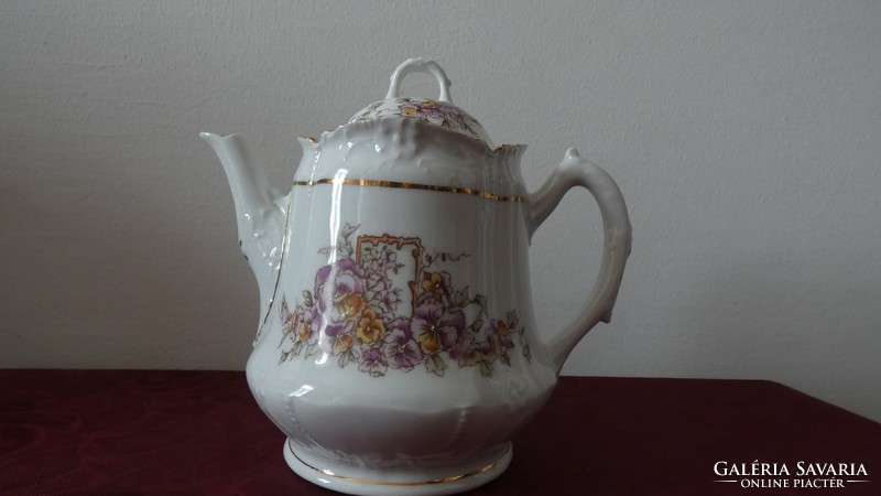 Antique porcelain tea jug with lid