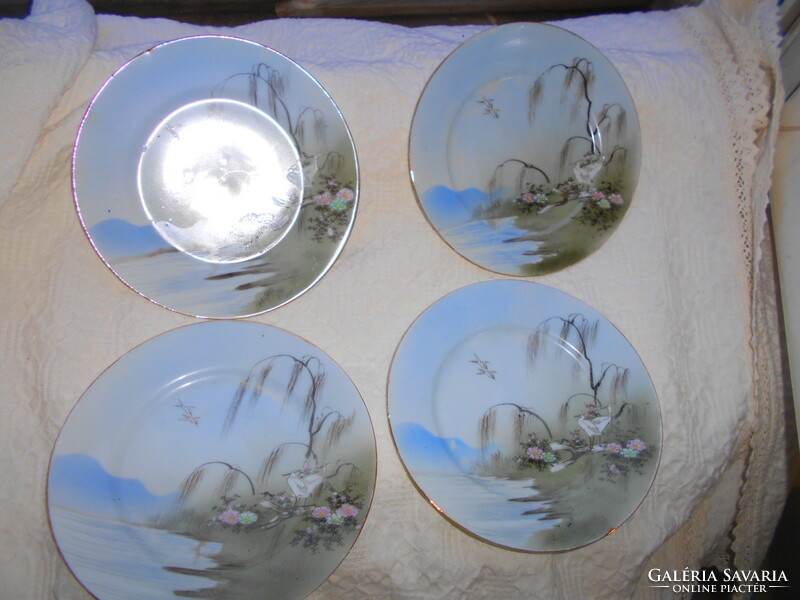 4 antique Kutani hand-painted plates with landscapes and birds on the waterfront
