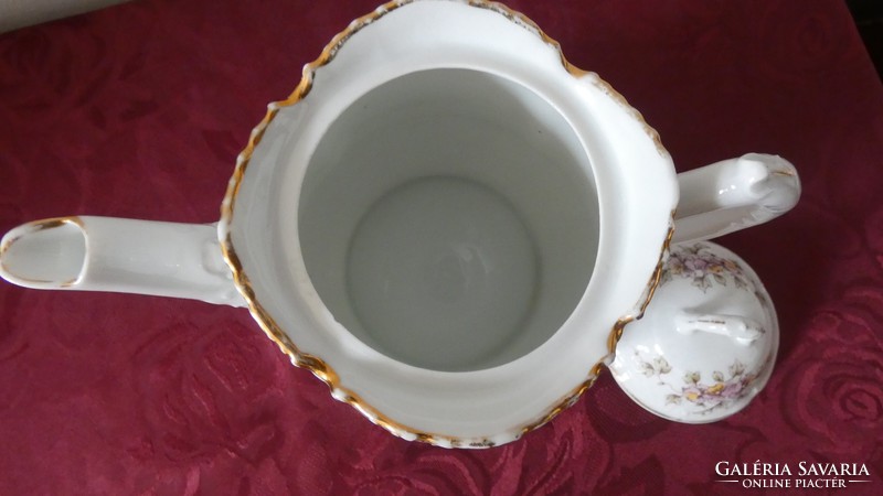 Antique porcelain tea jug with lid