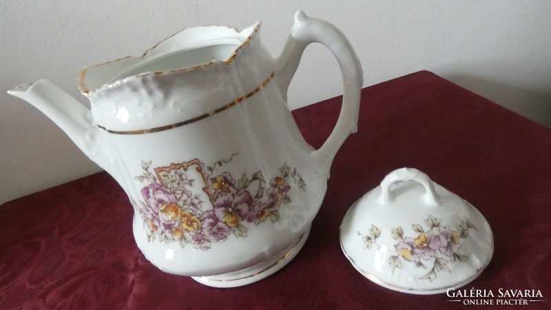 Antique porcelain tea jug with lid