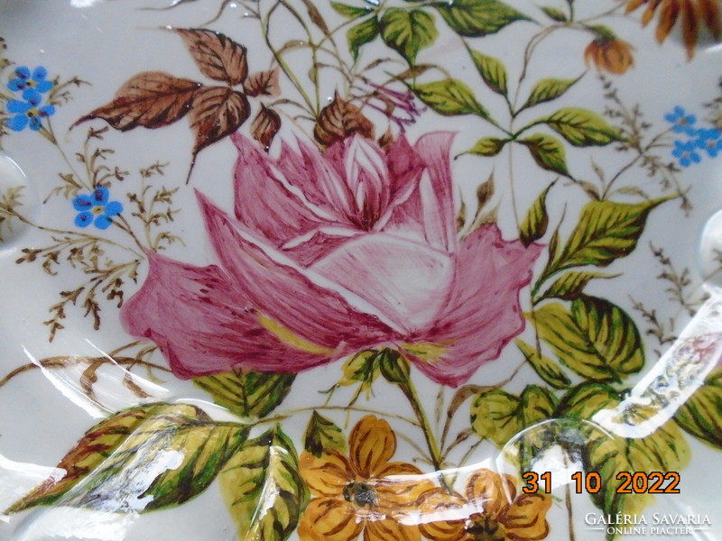 Renaissance revival hand-painted majolica bowl with a unique renaissance flower pattern