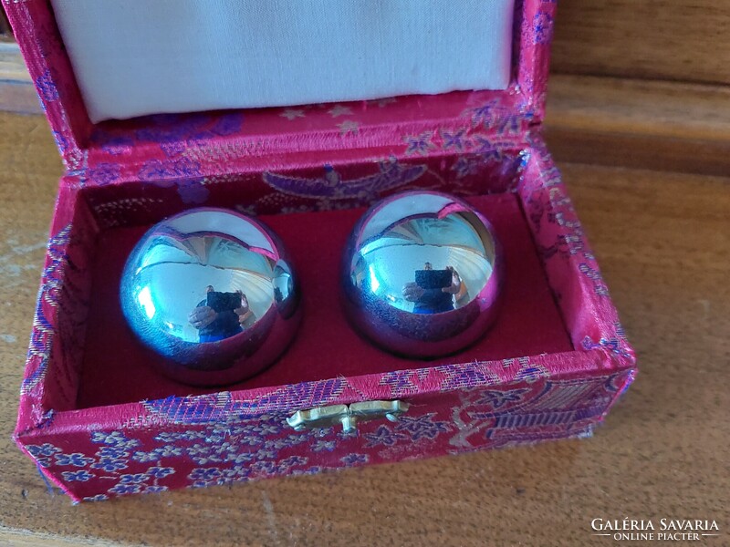 Chikung balls in a gift box covered with Chinese fabric