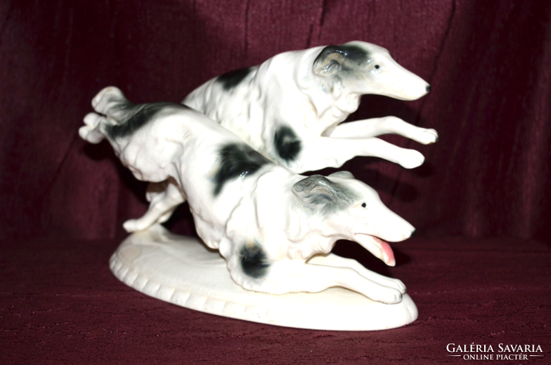 A pair of German sitzendorf Russian greyhounds with antique fur