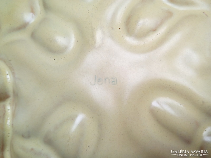 Jena offering a unique ceramic centerpiece