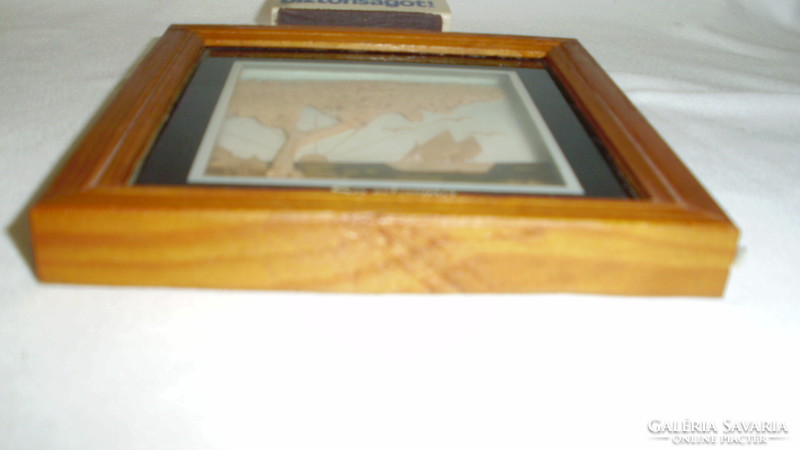 Multidimensional wall picture in a frame, under glass